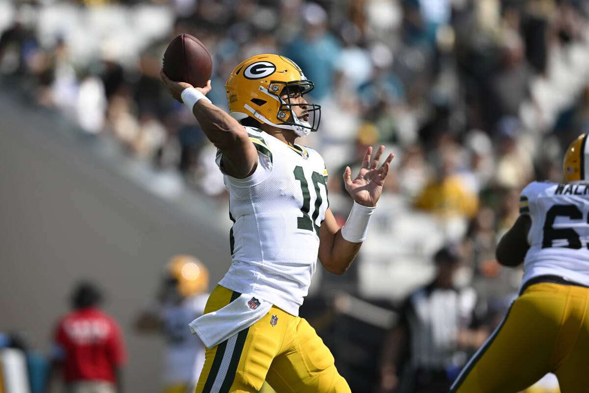 Green Bay Packers quarterback Jordan Love (10) throws a play against the Jacksonville Jaguars d ...