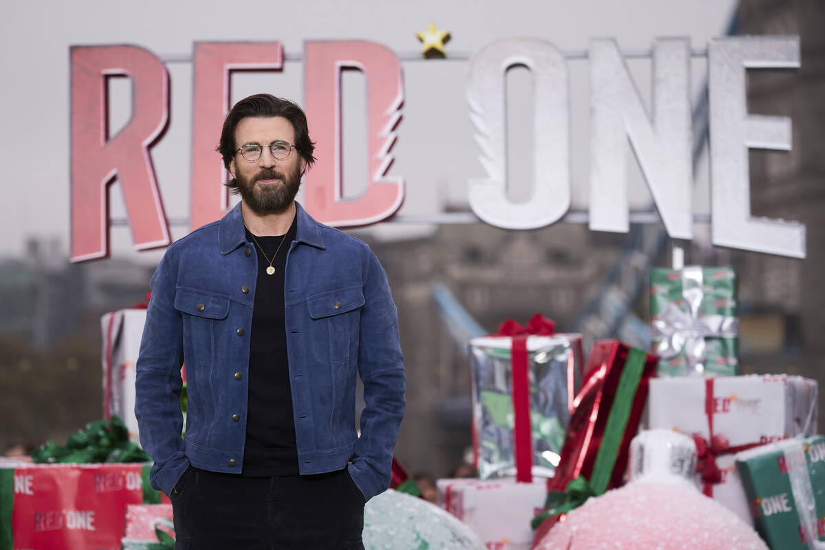 Chris Evans poses for photographers upon arrival at the moment event for the film 'Red One' on ...