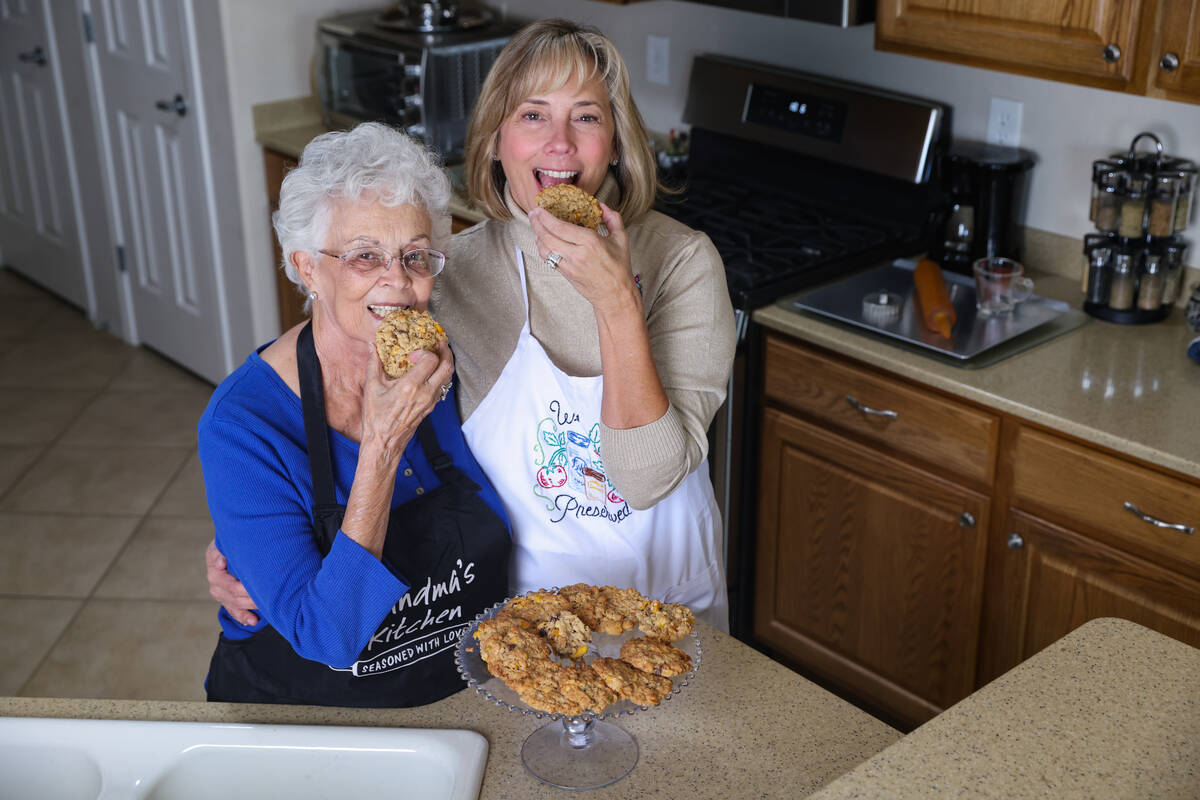 Evie Schild Hart, left, poses for a portrait with her daughter Sharon Willis, right, at Hart&#x ...