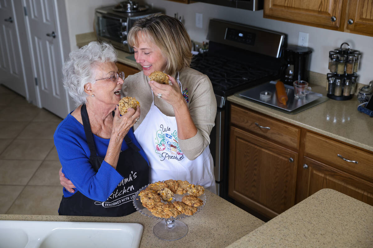 Evie Schild Hart, left, poses for a portrait with her daughter Sharon Willis, right, at Hart&#x ...