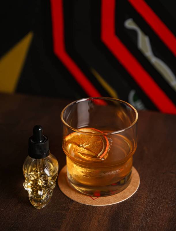 The Dusty Old-Fashioned, made with rye, rooibos, apricot, and a hint of African bird's eye chil ...