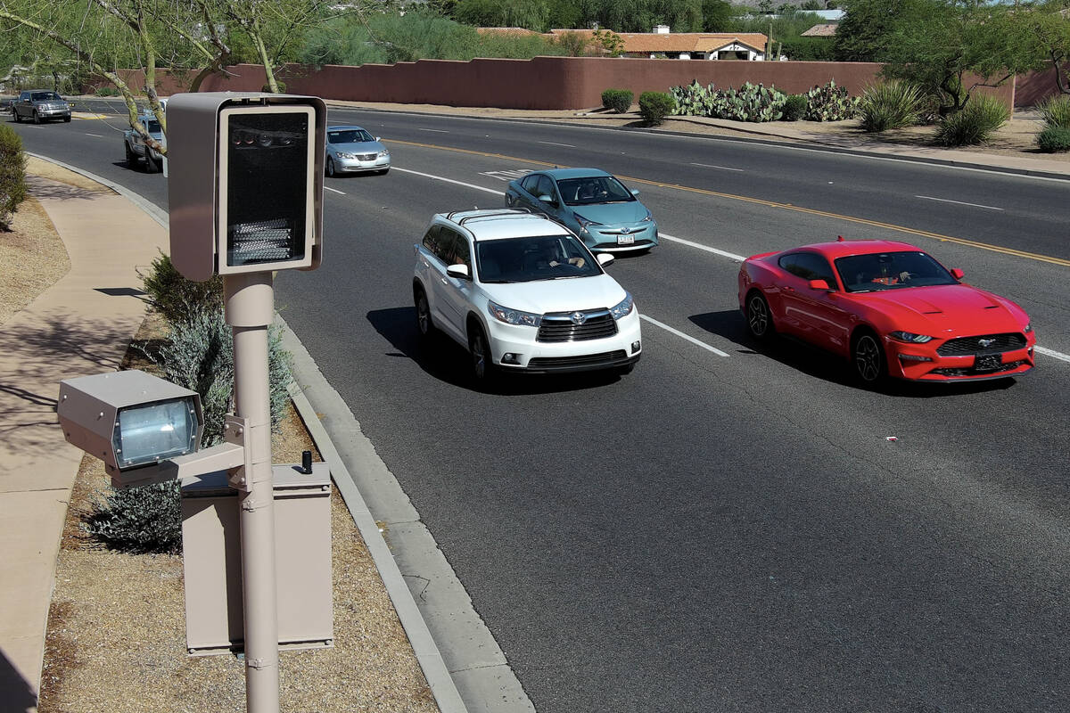 A red light camera is seen at Tatum Boulevard and McDonald Drive in Paradise Valley, Arizona Mo ...