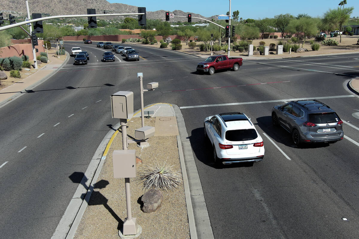 A red light camera is seen at Tatum Boulevard and McDonald Drive in Paradise Valley, Arizona Mo ...