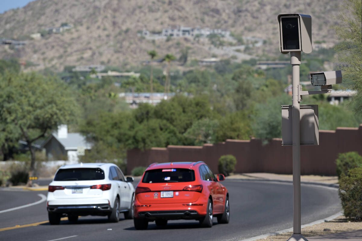 A red light camera is seen at Tatum Boulevard and McDonald Drive in Paradise Valley, Arizona Mo ...