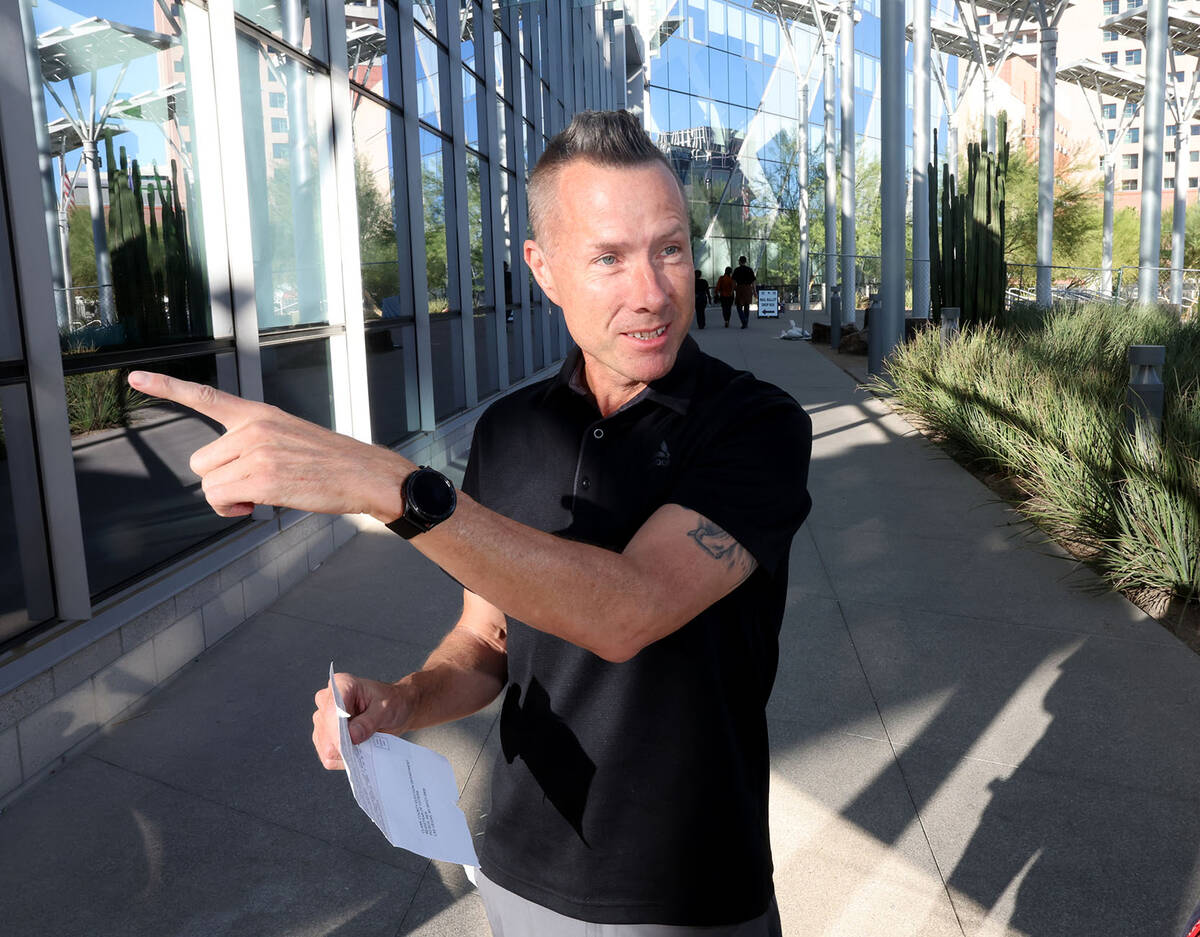 Roger Baldwin, who had just cast his ballot at Las Vegas City Hall, talks to a reporter Wednesd ...