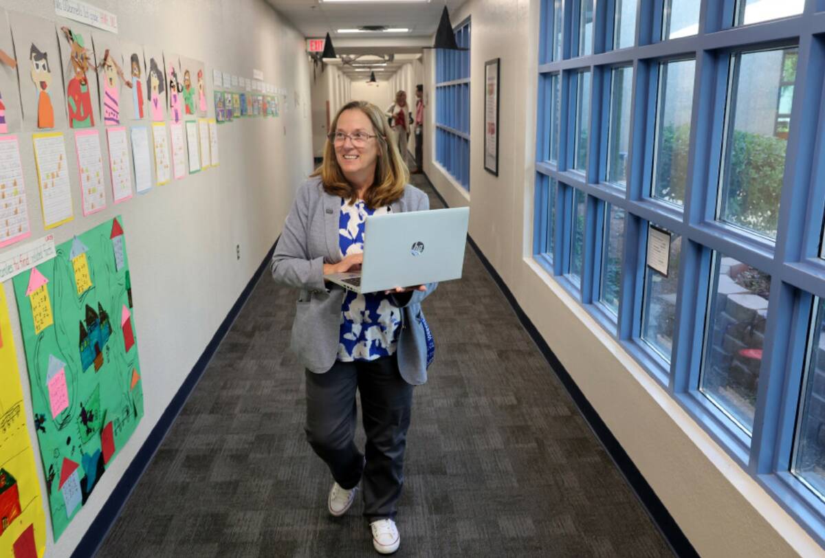 Lee Antonello Elementary School Principal Kathi Rozek walks in a hallway at the Las Vegas schoo ...