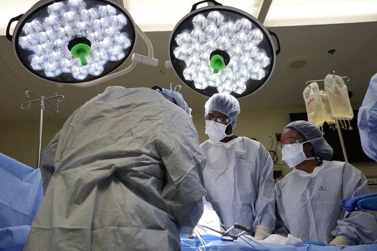 Meharry Medical College students watch as the liver and kidneys are removed from an organ donor ...