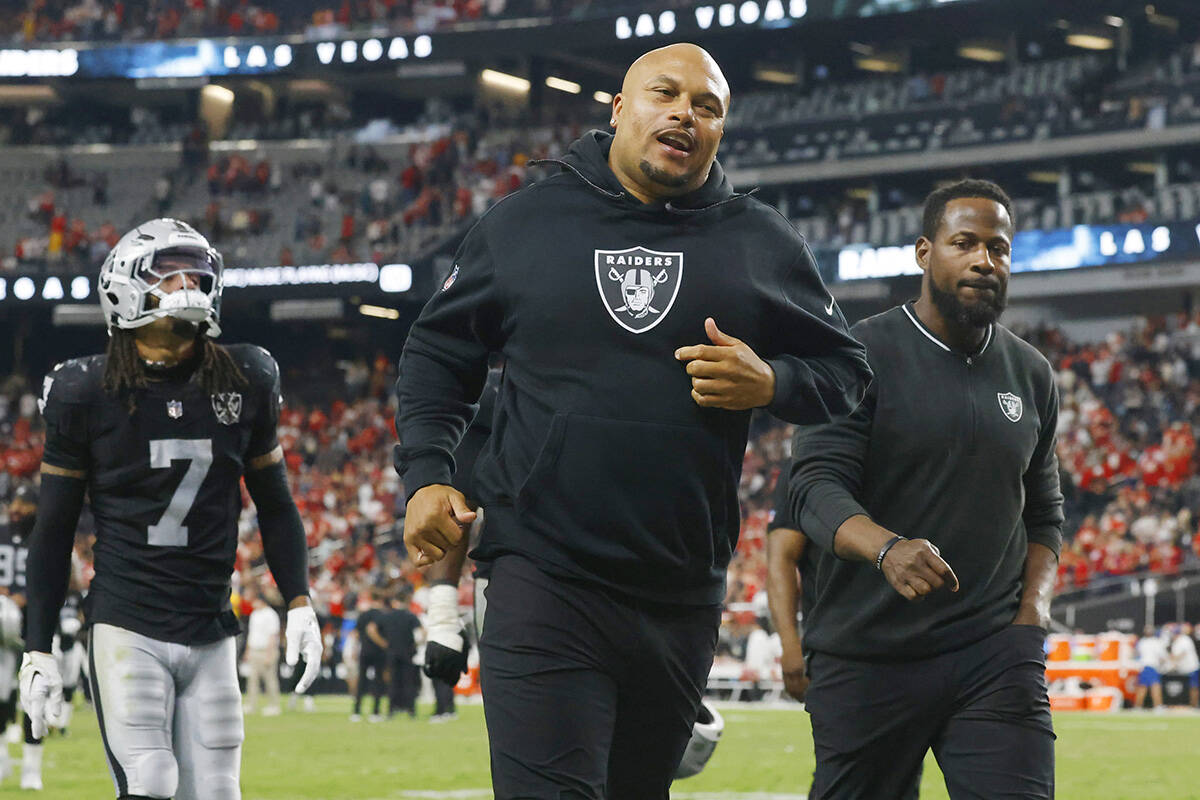 Raiders head coach Antonio Pierce runs off the field after an NFL game against Kansas City Chie ...