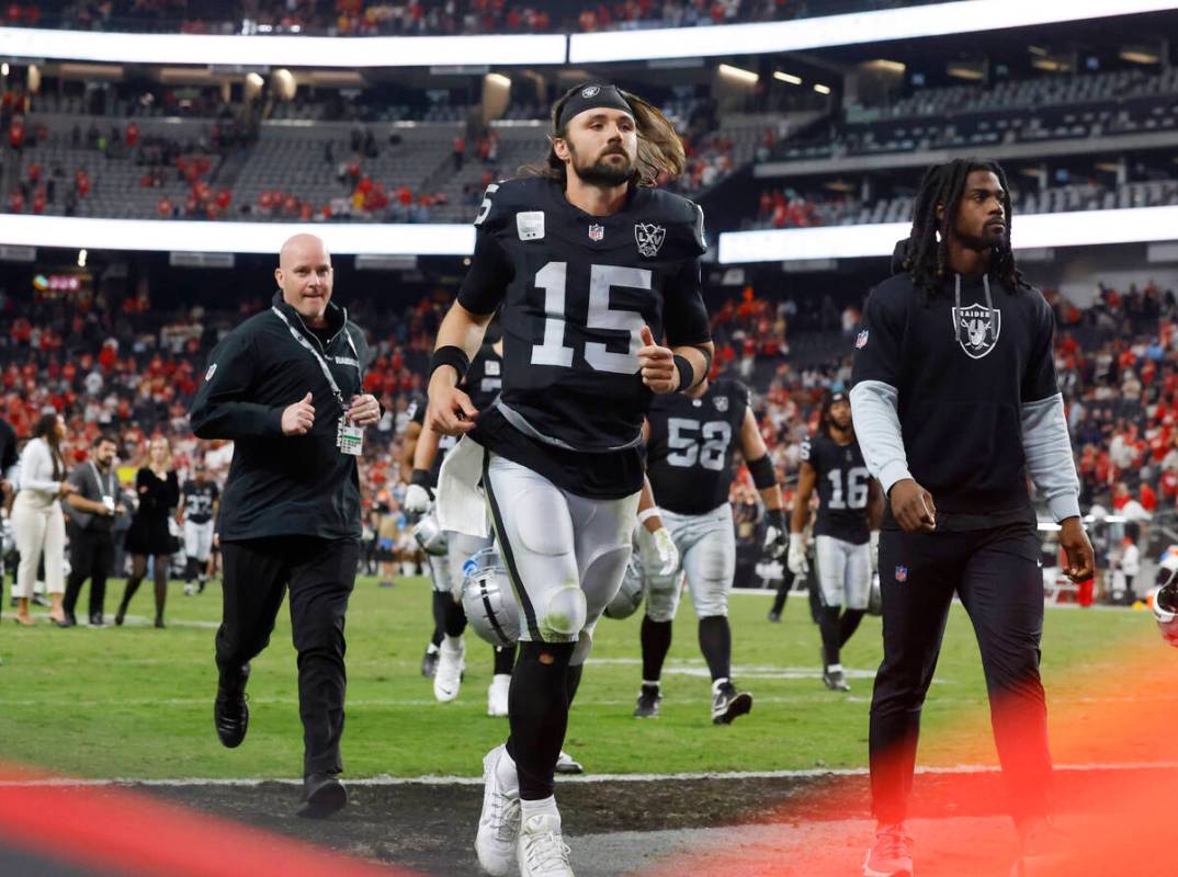 Raiders quarterback Gardner Minshew (15) leaves the field after an NFL game against Kansas City ...