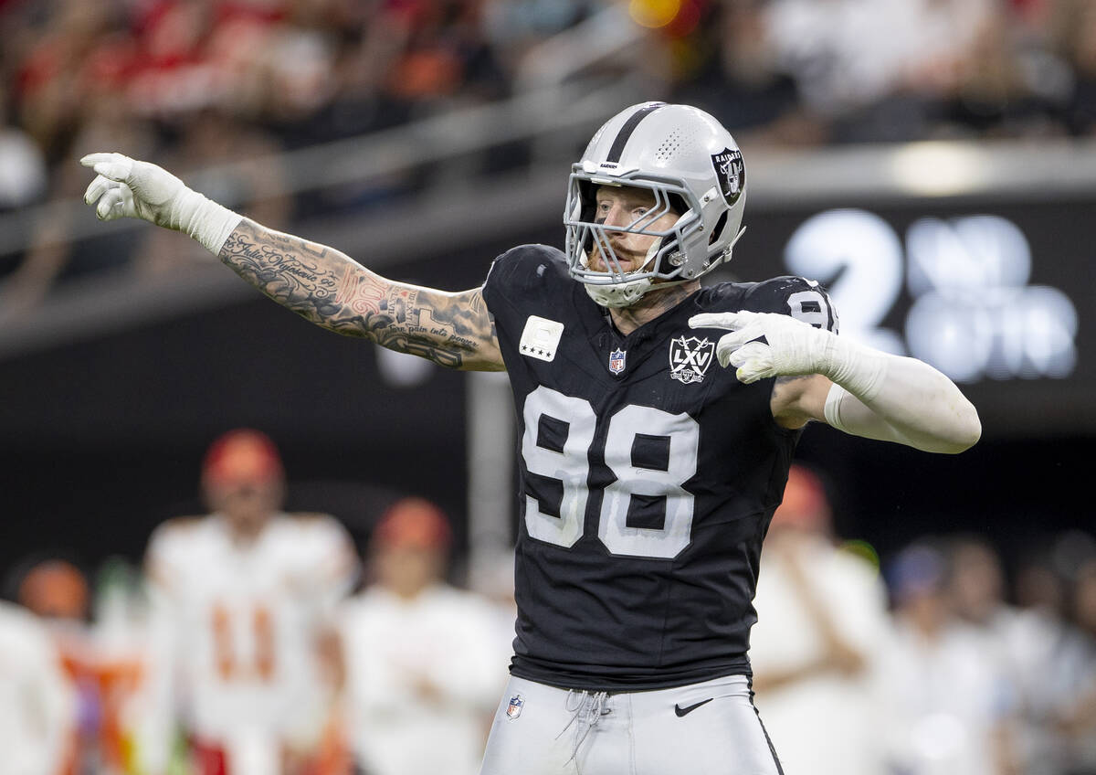 Raiders defensive end Maxx Crosby (98) reacts after a flag is thrown during the first half of t ...