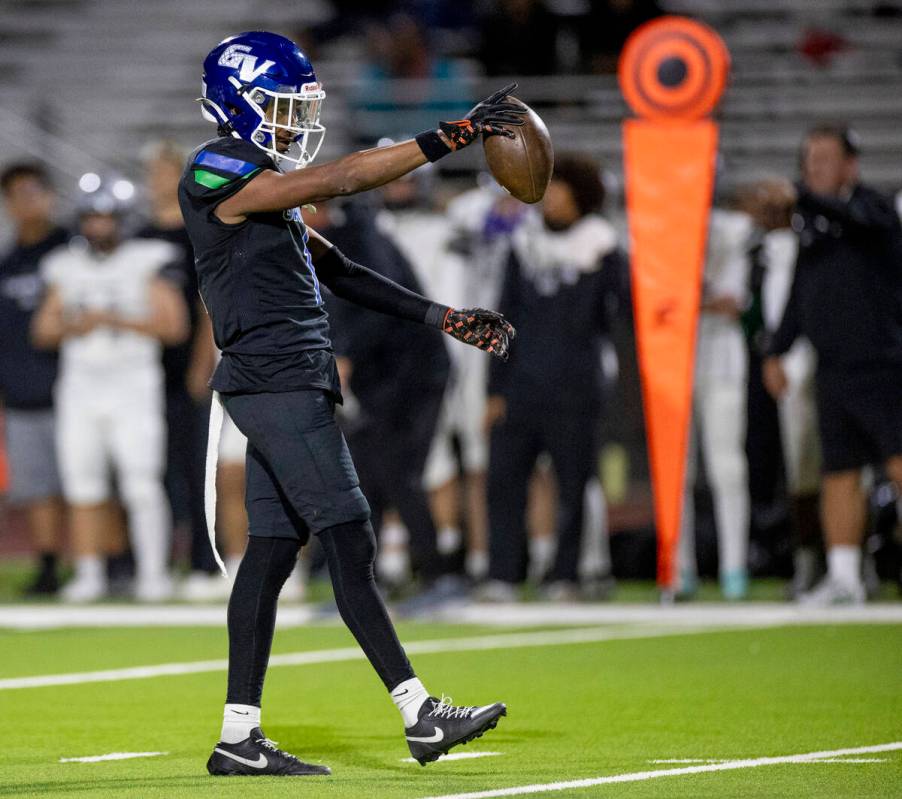 Green Valley senior Trey Glasper (1) celebrates making a first down during the 5A Division II S ...