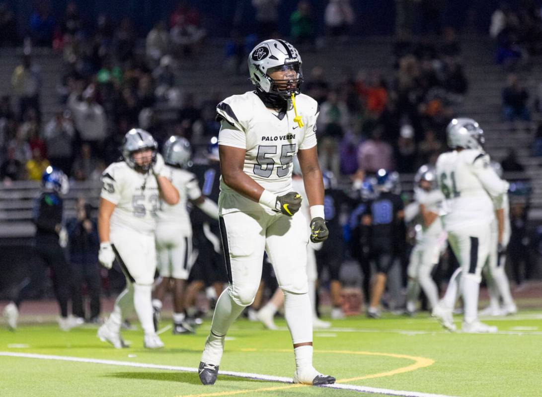 Palo Verde sophomore Justin Chandler (55) becomes frustrated after Green Valley players managed ...