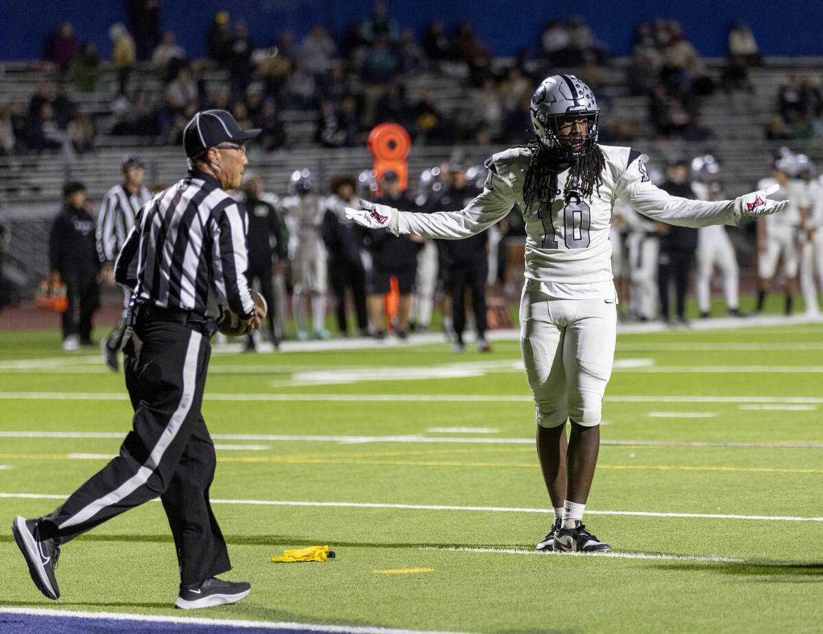 Palo Verde senior Jakari Burrell (10) reacts after a flag is thrown during the 5A Division II S ...