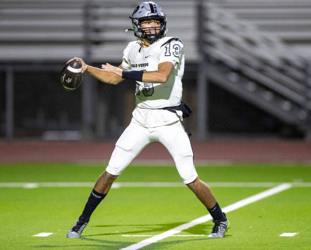 Palo Verde senior Dawson Perkes (13) looks to throw the ball during the 5A Division II Southern ...