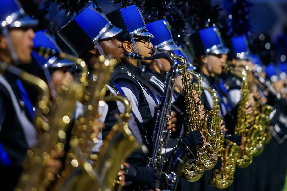 Shadow Ridge Band plays the national anthem before a 5A Division II Southern League quarterfina ...