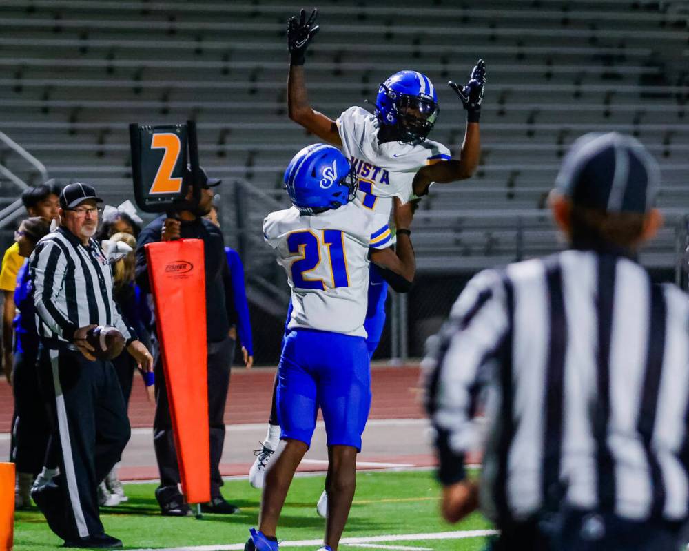 Sierra Vista’s Adonis Vaughn (1) celebrates after a successful two-point conversion duri ...