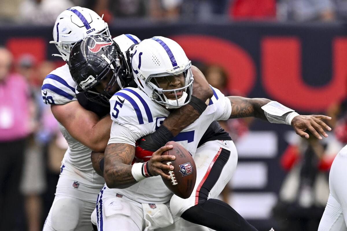 Houston Texans defensive end Danielle Hunter (55) sacks Indianapolis Colts quarterback Anthony ...