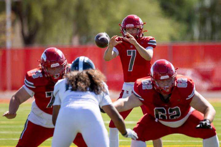 Arbor View quarterback Thaddeus Thatcher (7) snaps the ball during the high school football gam ...