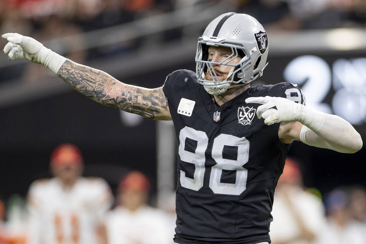 Raiders defensive end Maxx Crosby (98) reacts after a flag is thrown during the first half of t ...