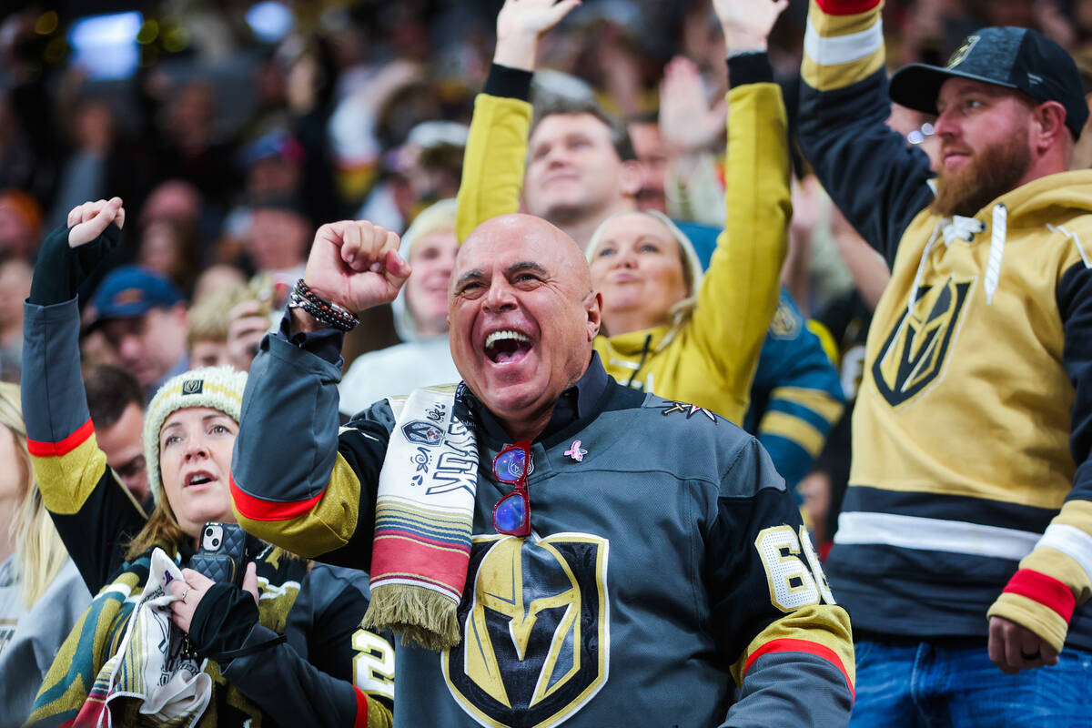 Golden Knights fans cheer after a goal during an NHL hockey game between the Golden Knights and ...