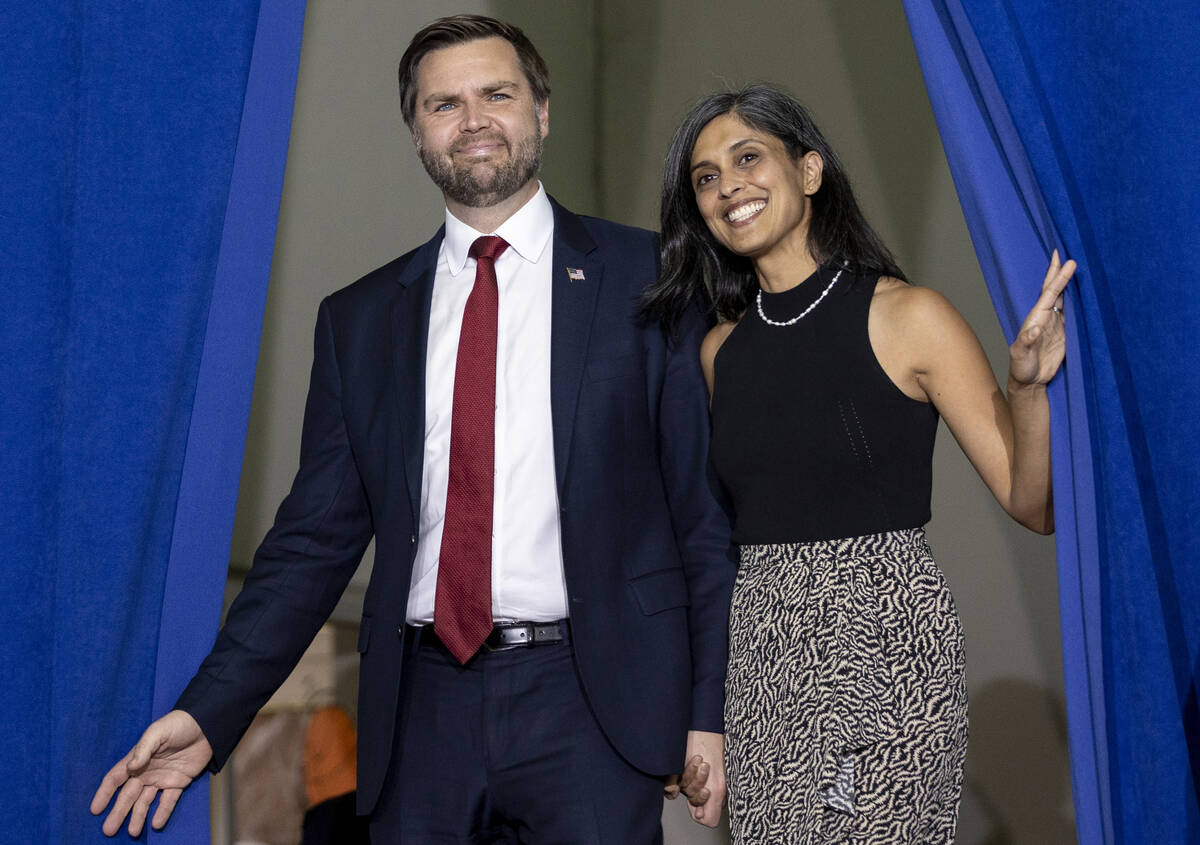 Republican vice presidential nominee Sen. JD Vance, R-Ohio, left, and wife Usha Vance, right, e ...