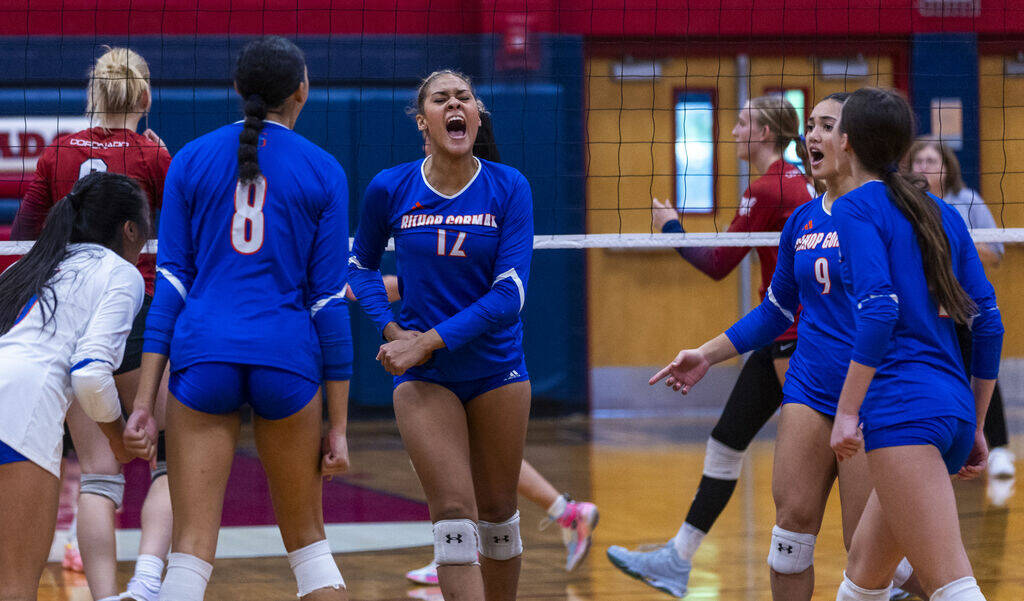 Bishop Gorman's Brooklynn Williams (12) is pumped up after another point against Coronado durin ...