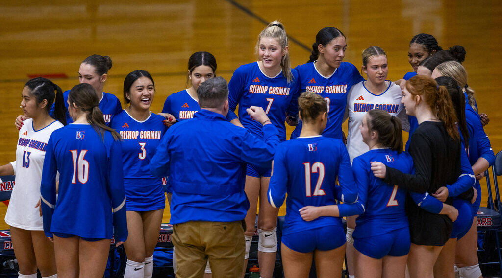 Bishop Gorman players come together to talk with head coach Gregg Nunley after taking the first ...