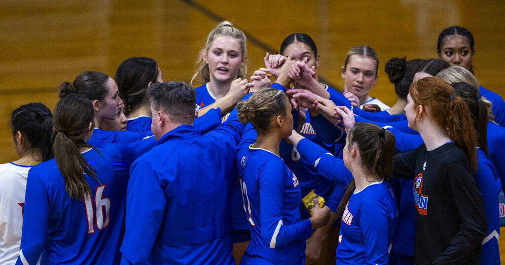 Bishop Gorman players with head coach Gregg Nunley ready for the second set against Coronado du ...