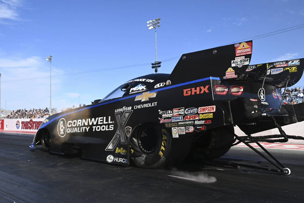 In this photo provided by the NHRA, Funny Car points leader Austin Prock sits in the provisiona ...