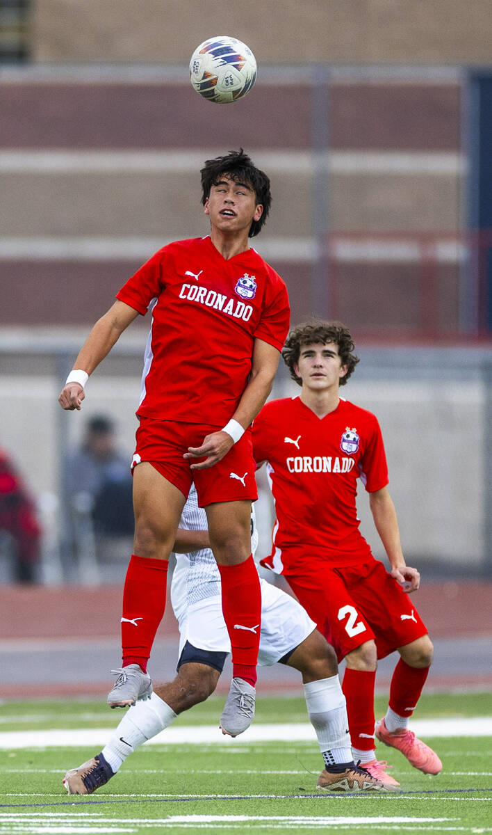 Coronado midfielder Cy Adams (8) has a ball away from Palo Verde during the first half of their ...