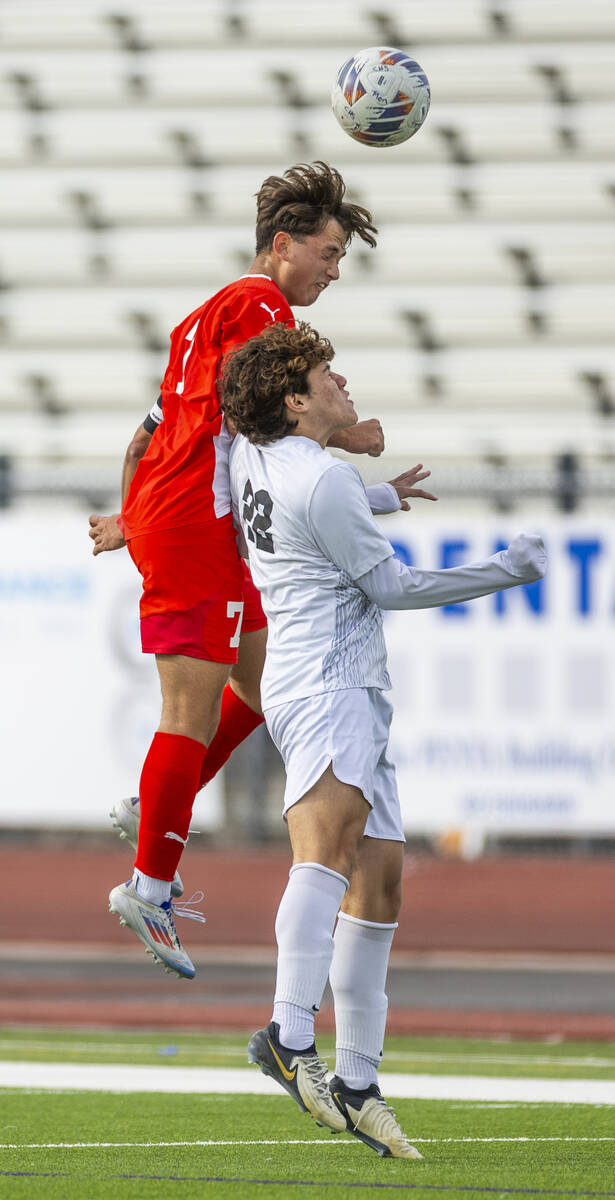 Coronado forward Austin Kiernan (7) heads the ball against Palo Verde midfielder Trustin Parker ...