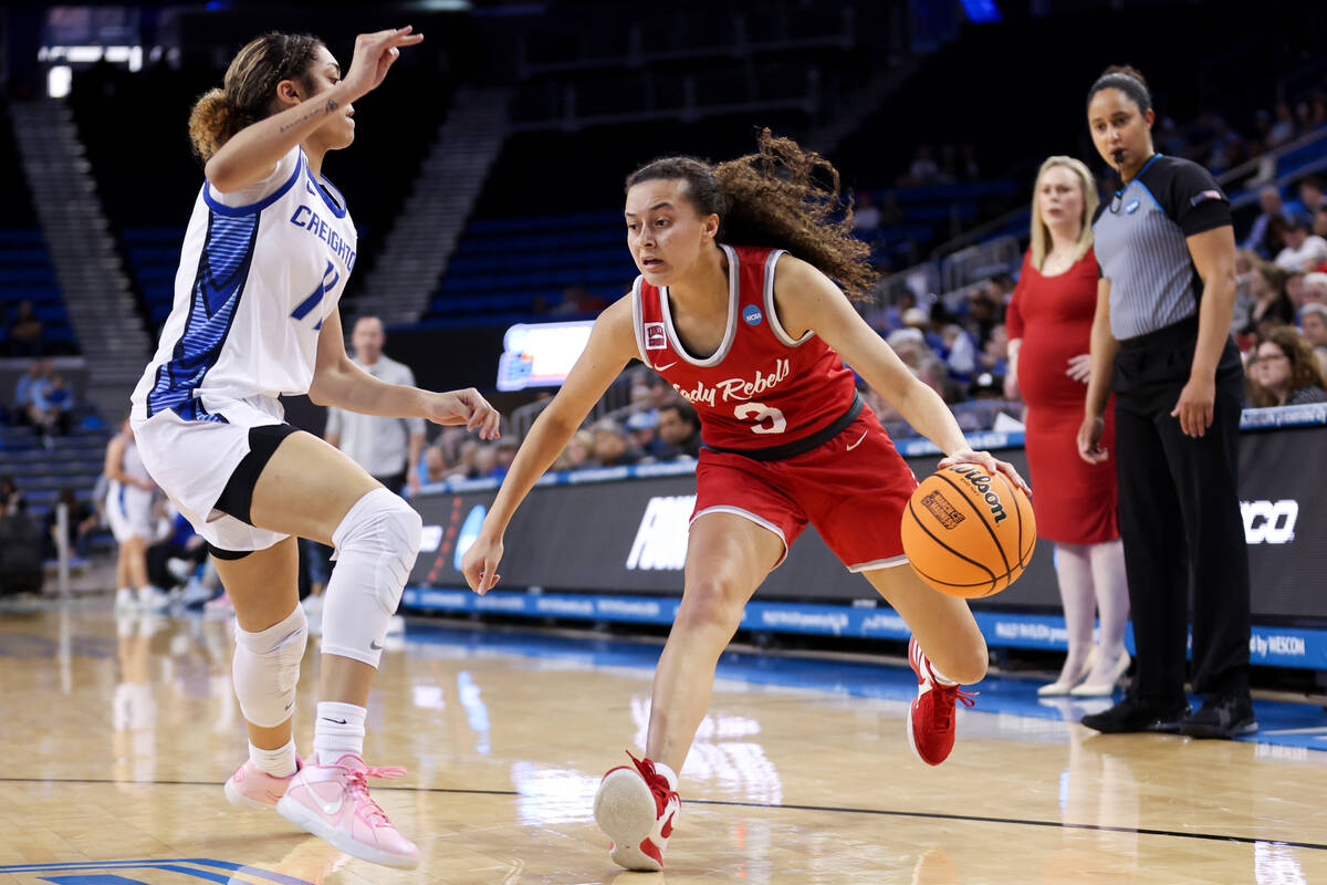 UNLV Lady Rebels guard Kiara Jackson (3) drives toward the hoop against Creighton Bluejays guar ...