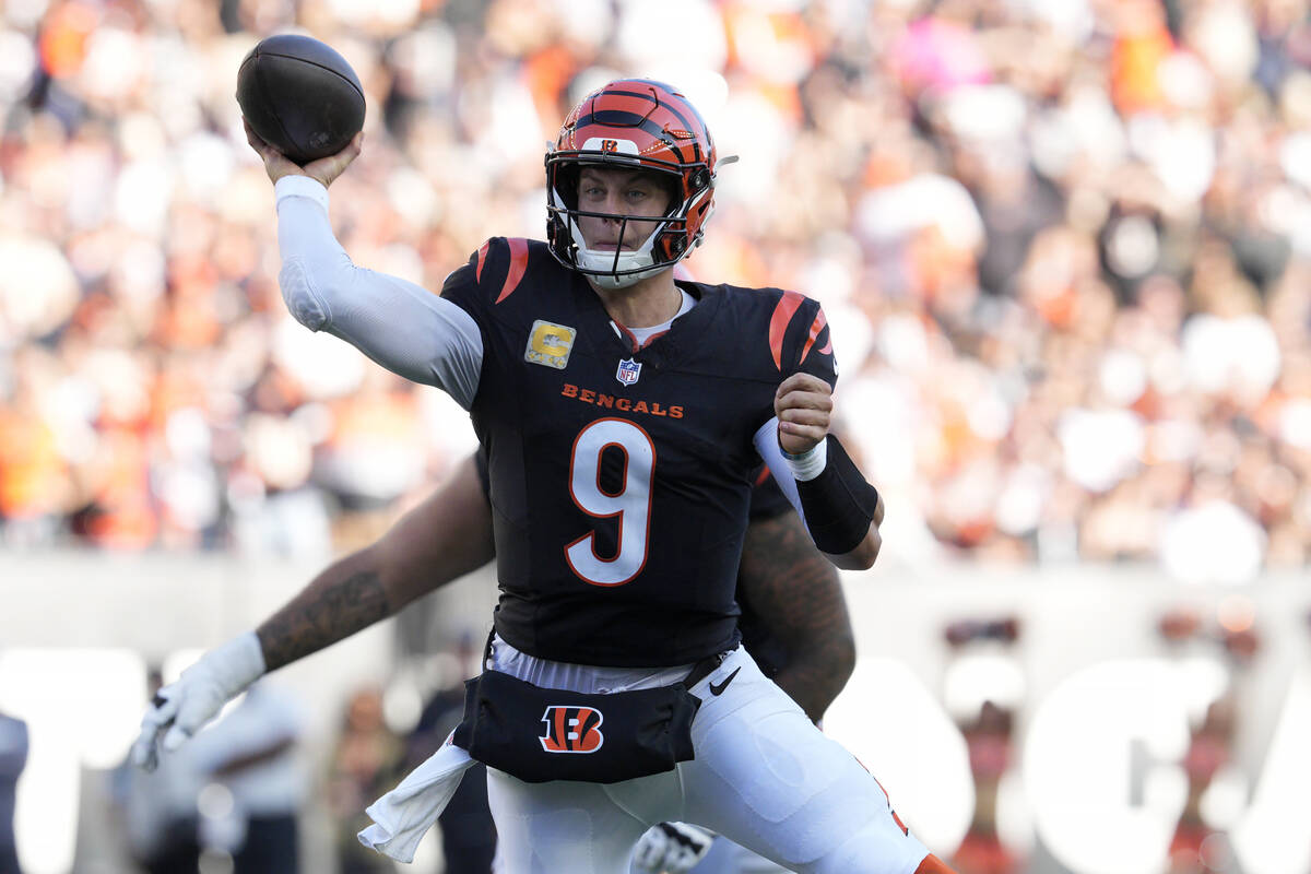 Cincinnati Bengals quarterback Joe Burrow (9) passes against the Las Vegas Raiders during the s ...