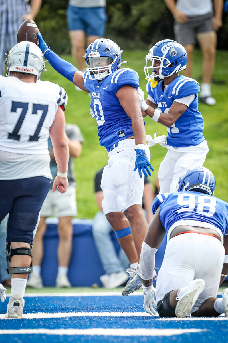 Mayville State linebacker Devon Woods, a Shadow Ridge graduate, celebrates his fumble recovery ...