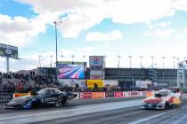 NHRA drivers Austin Prock, left, and Blake Alexander race during the NHRA Funny Car quarterfina ...