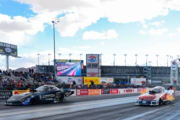 NHRA drivers Austin Prock, left, and Blake Alexander race during the NHRA Funny Car quarterfina ...