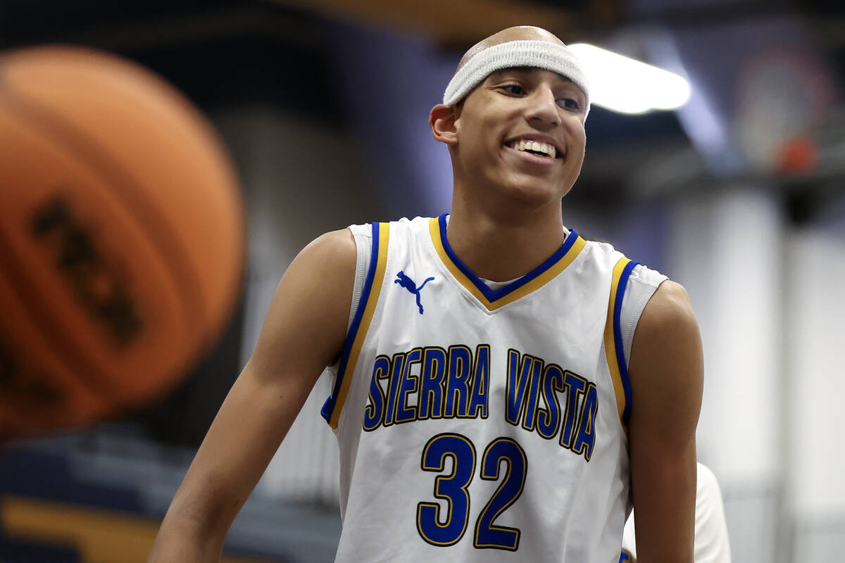 Sierra Vista center Xavion Staton (32) smiles during the first half of a high school basketball ...