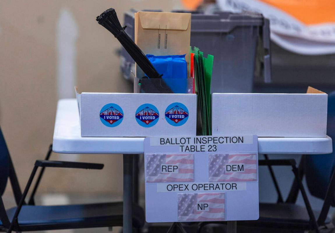 One of the many ballot inspection tables in preparation for elections at the Clark County Elect ...