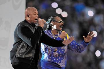 Dr. Dre, left, and Snoop Dogg perform during halftime of the NFL Super Bowl 56 football game be ...