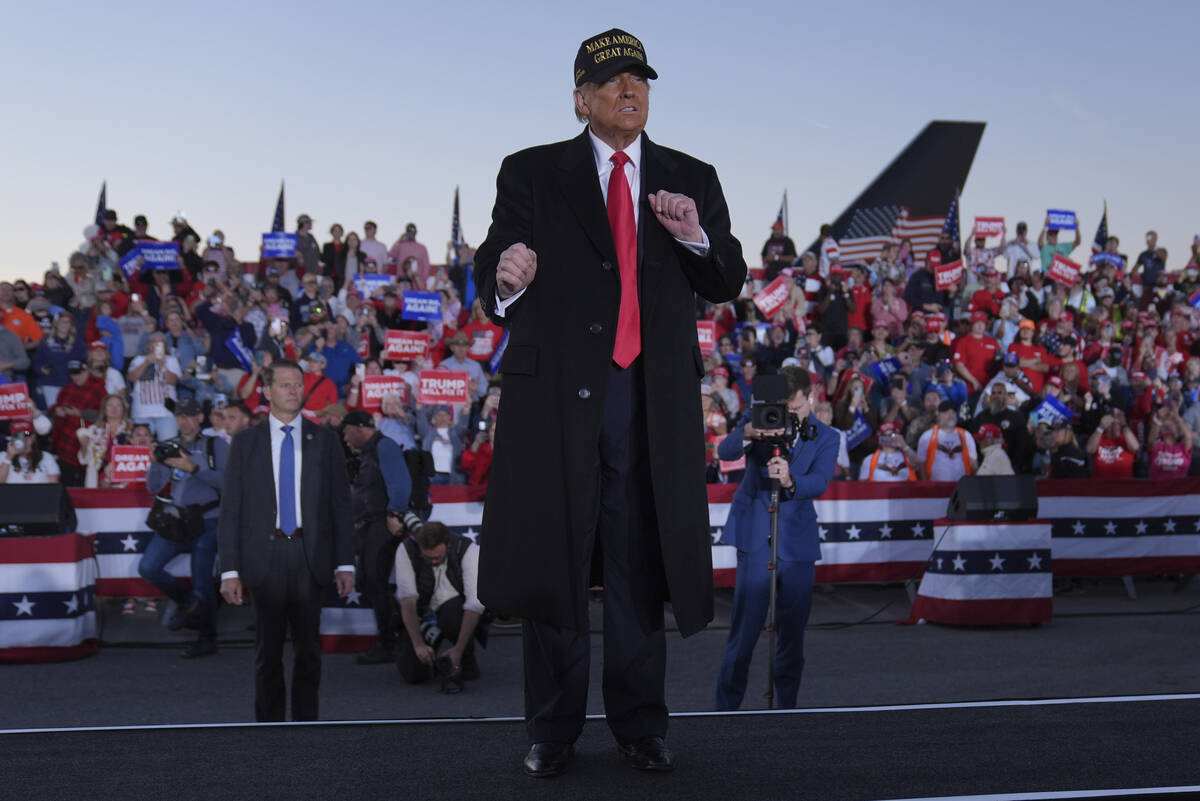 Republican presidential nominee former President Donald Trump dances at a campaign rally at Kin ...