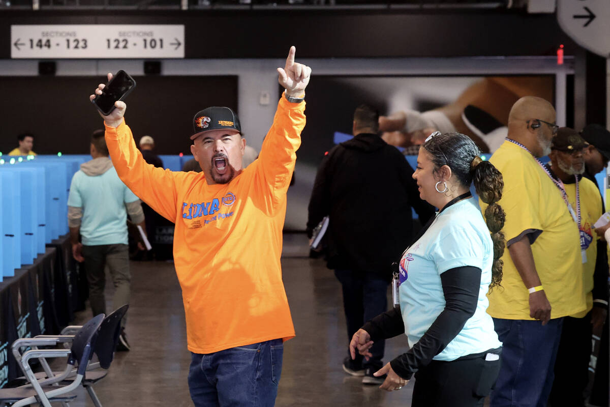 Laborer's Union Local 872 member Jake Macias celebrates before voting at Allegiant Stadium in L ...