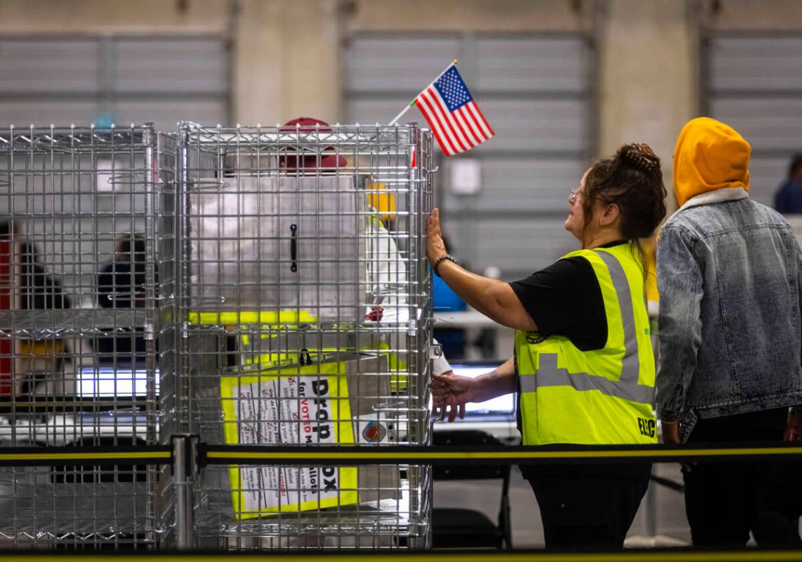 Ballot drop boxes are processed at the Clark County Election Department warehouse on Tuesday, N ...