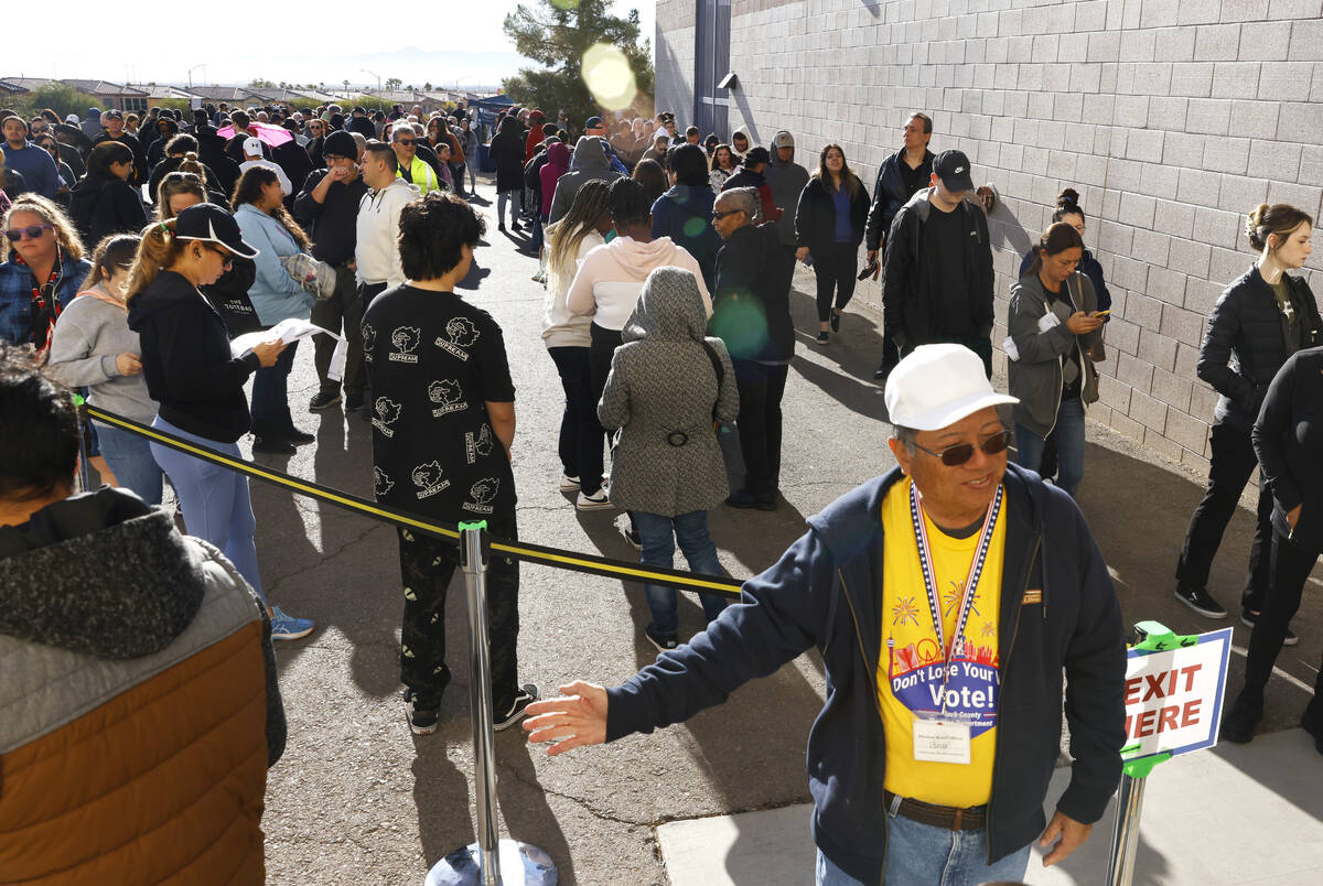 People line up to cast their votes at Desert Breeze Community Center, Tuesday, Nov. 5, 2024, in ...