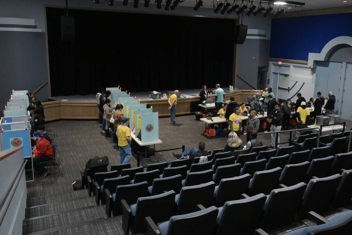 Voters cast their ballots at the Winchester Dondero Cultural Center Tuesday, November 5, 2024, ...