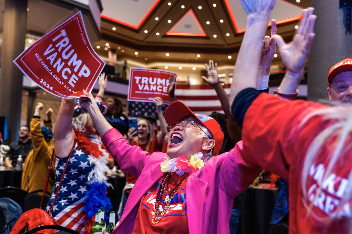 Supporter Sandi Steinbeck yells out as she and others celebrate as Donald Trump is re-elected P ...