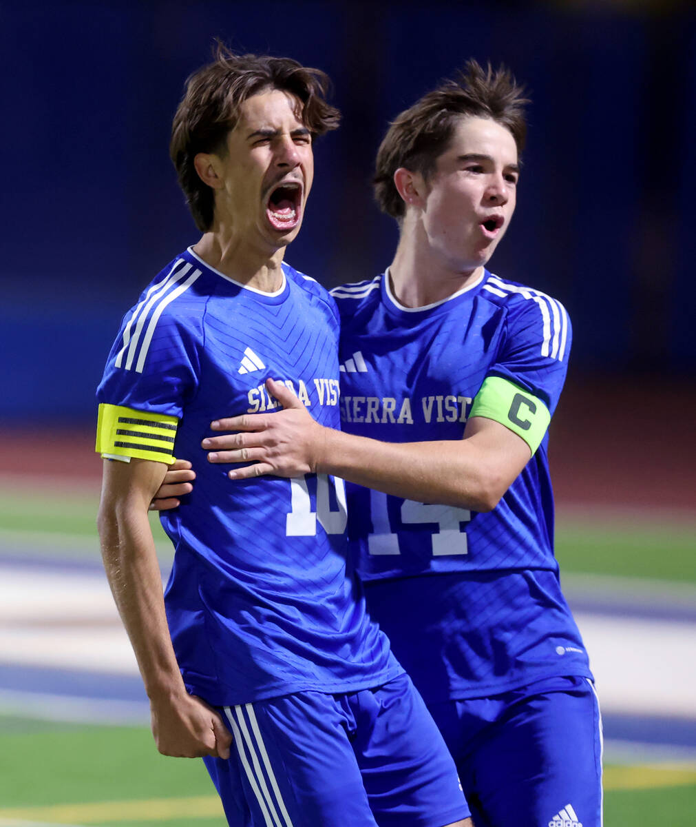 Sierra Vista forward Lazzar Ramos (10) celebrates scoring a goal against Faith Lutheran with te ...