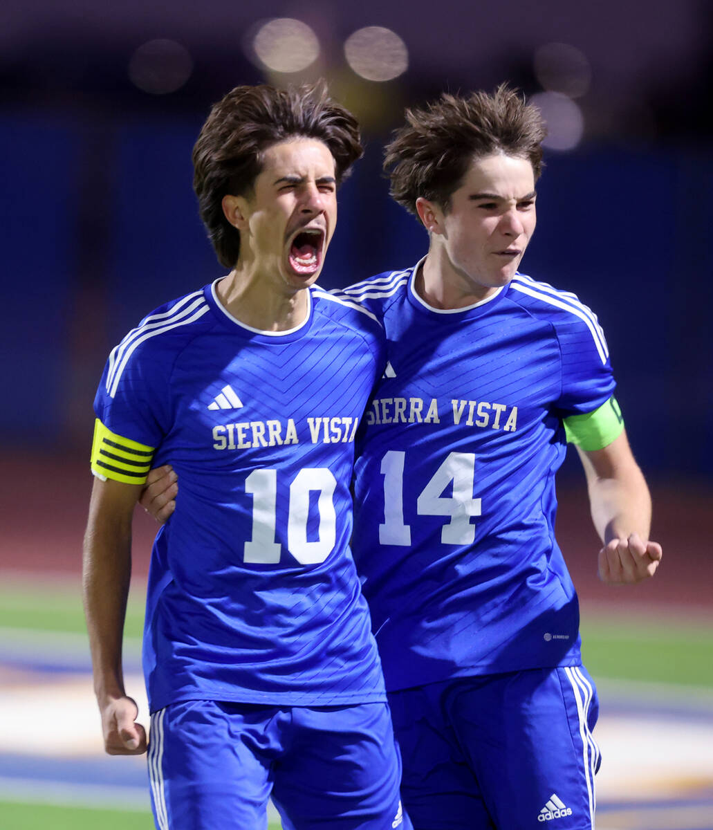 Sierra Vista forward Lazzar Ramos (10) celebrates scoring a goal against Faith Lutheran with te ...