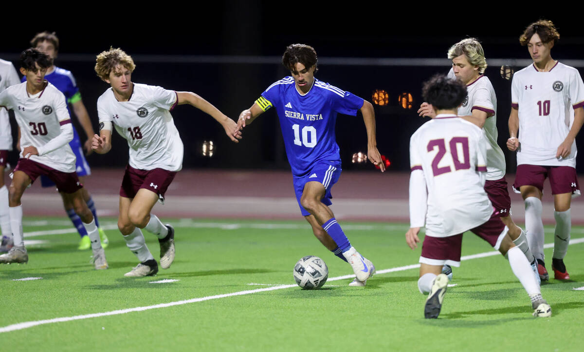 Sierra Vista forward Lazzar Ramos (10) dribbles the ball against Faith Lutheran in the second h ...