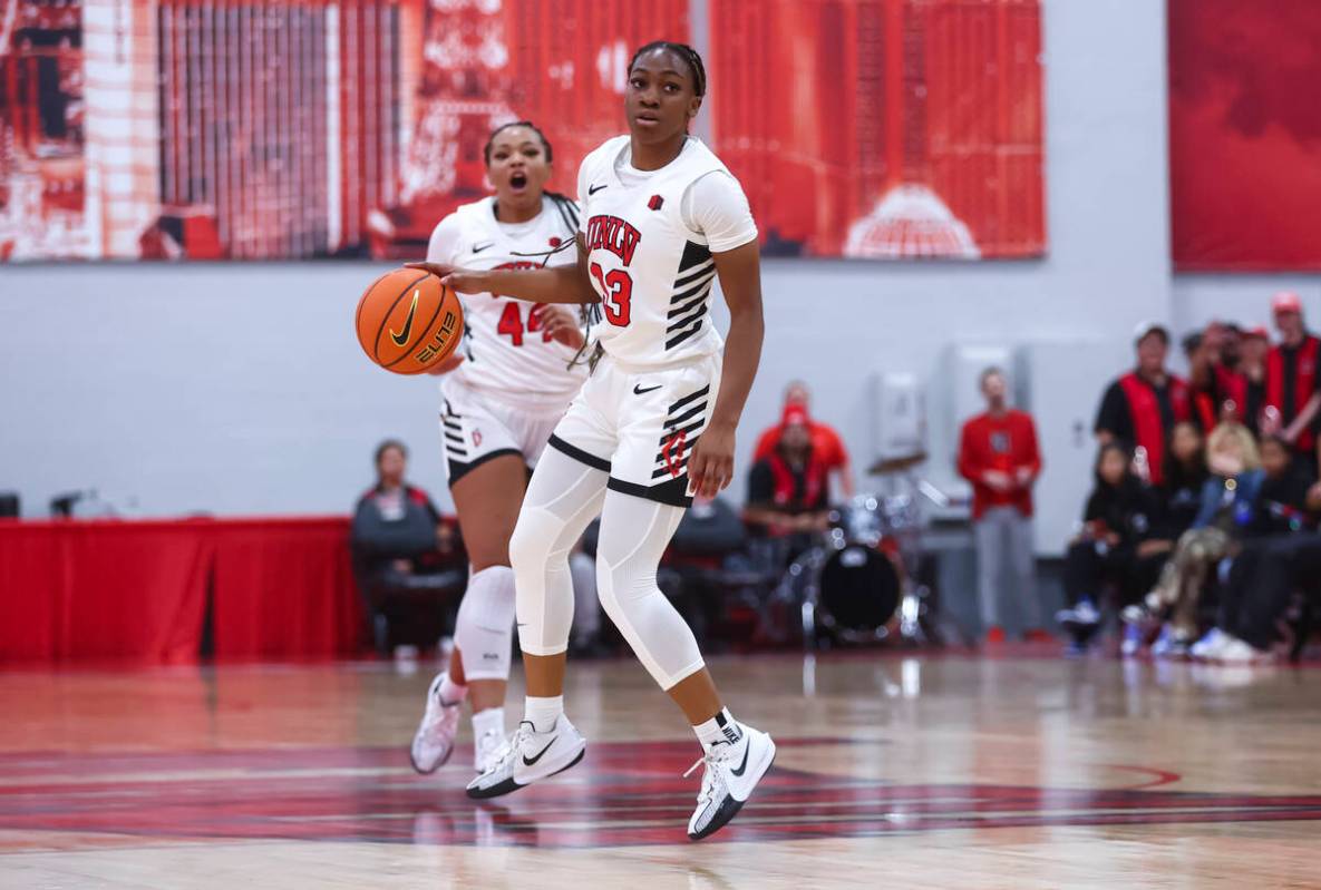 UNLV Lady Rebels guard Amarachi Kimpson (33) brings the ball up court against Loyola Marymount ...