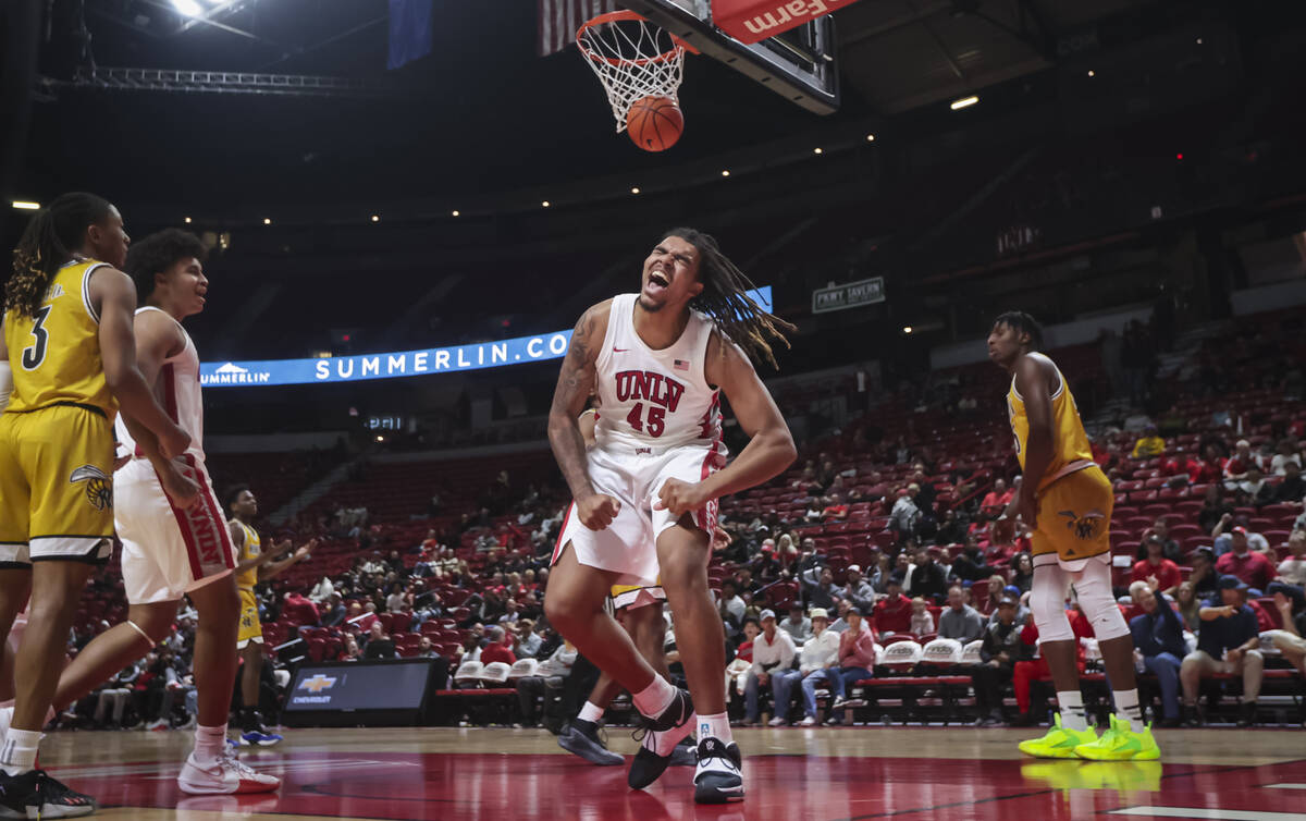 UNLV Rebels forward Jeremiah Cherry (45) reacts after scoring against the Alabama State Hornets ...